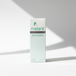Лицьова сторона коробки крему проти пігментації Melanil для вирівнювання тону шкіри.
